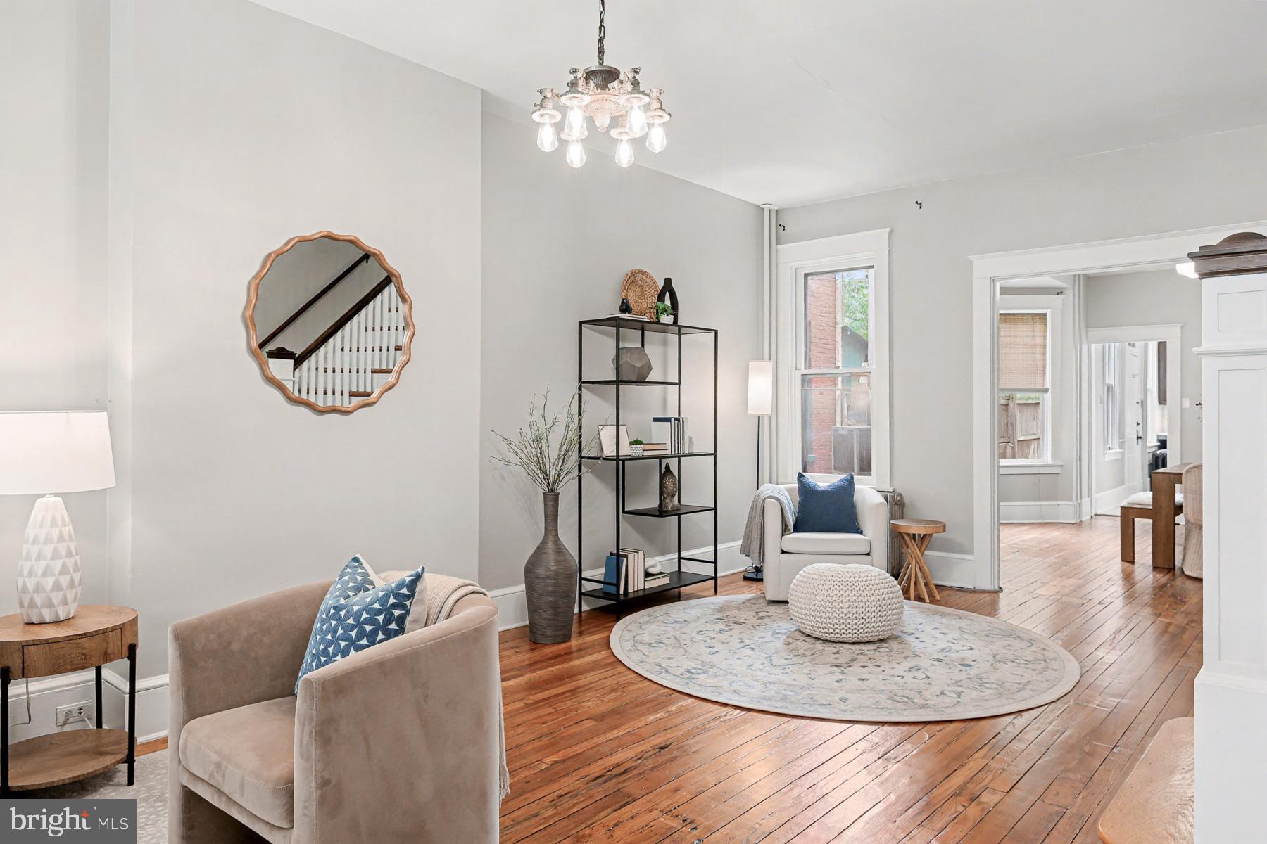 16 West Liberty Street Lancaster, PA 17603 - Photo 12 of 55 a living room with furniture and a chandelier