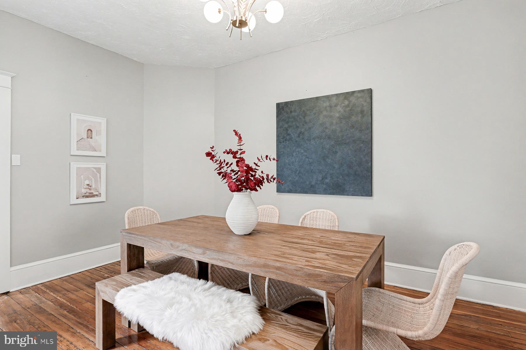 16 West Liberty Street Lancaster, PA 17603 - Photo 16 of 55 a dining room with furniture and wooden floor