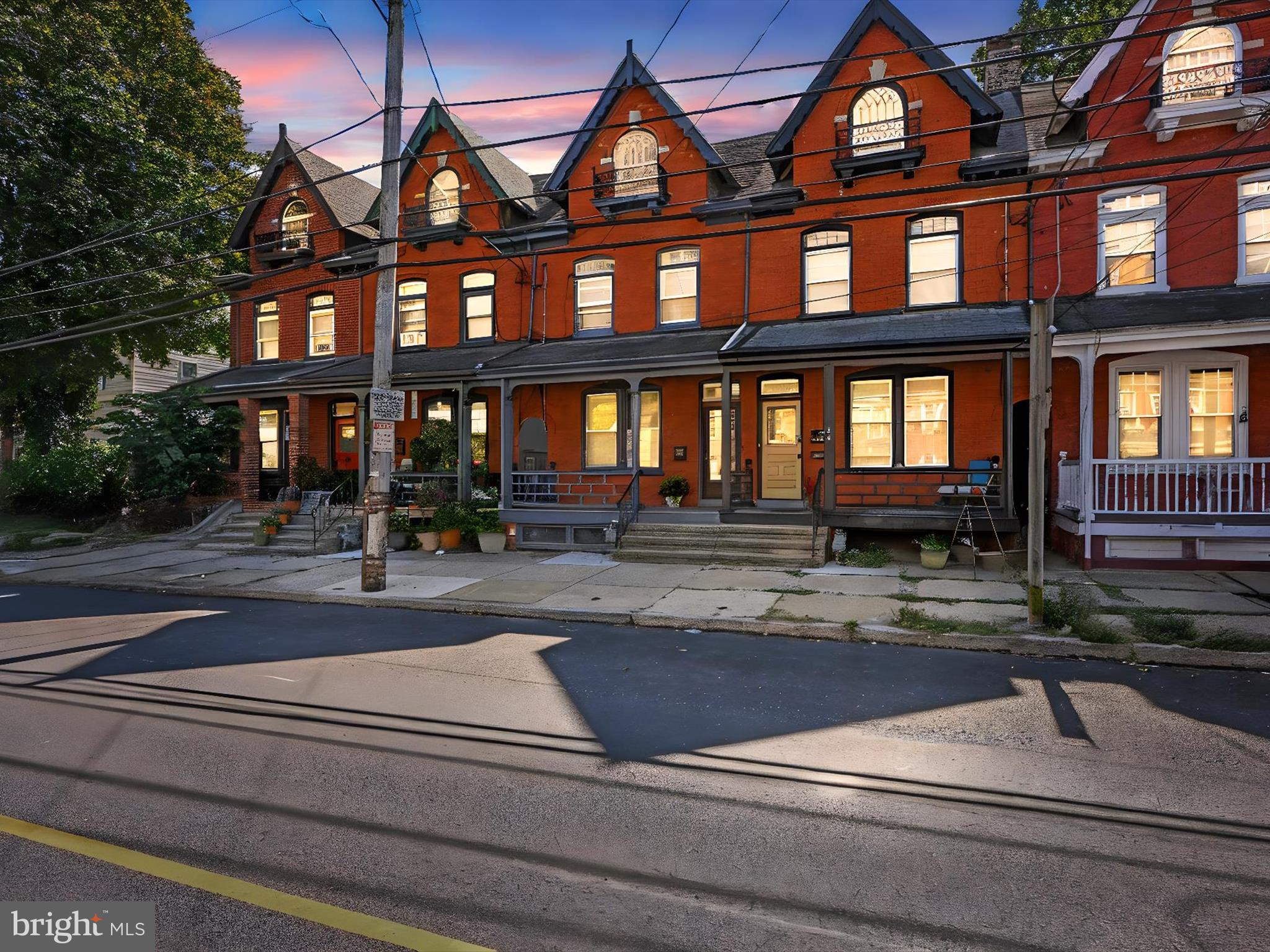 16 West Liberty Street Lancaster, PA 17603 - Photo 2 of 55 a front view of a residential apartment building with a yard