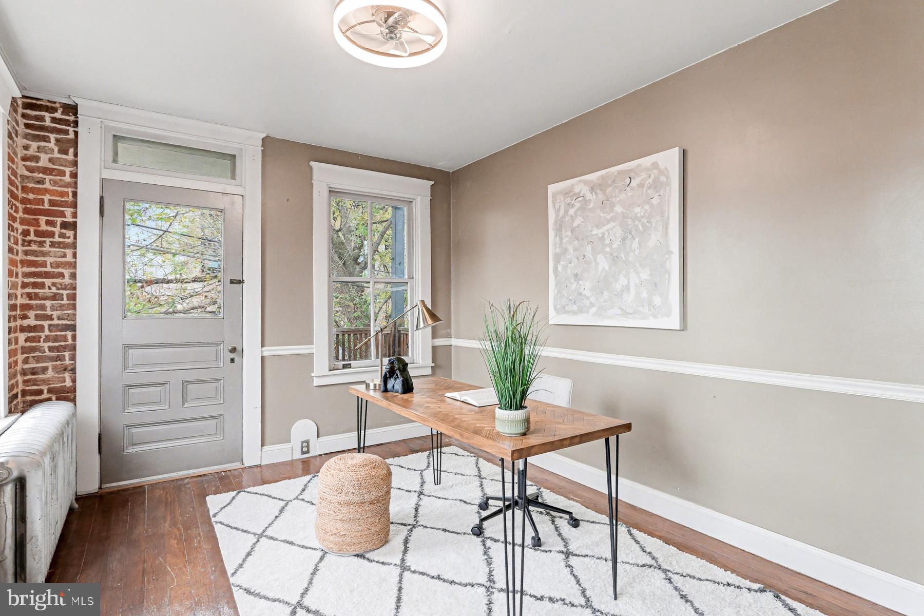 16 West Liberty Street Lancaster, PA 17603 - Photo 26 of 55 a workspace with furniture and a window