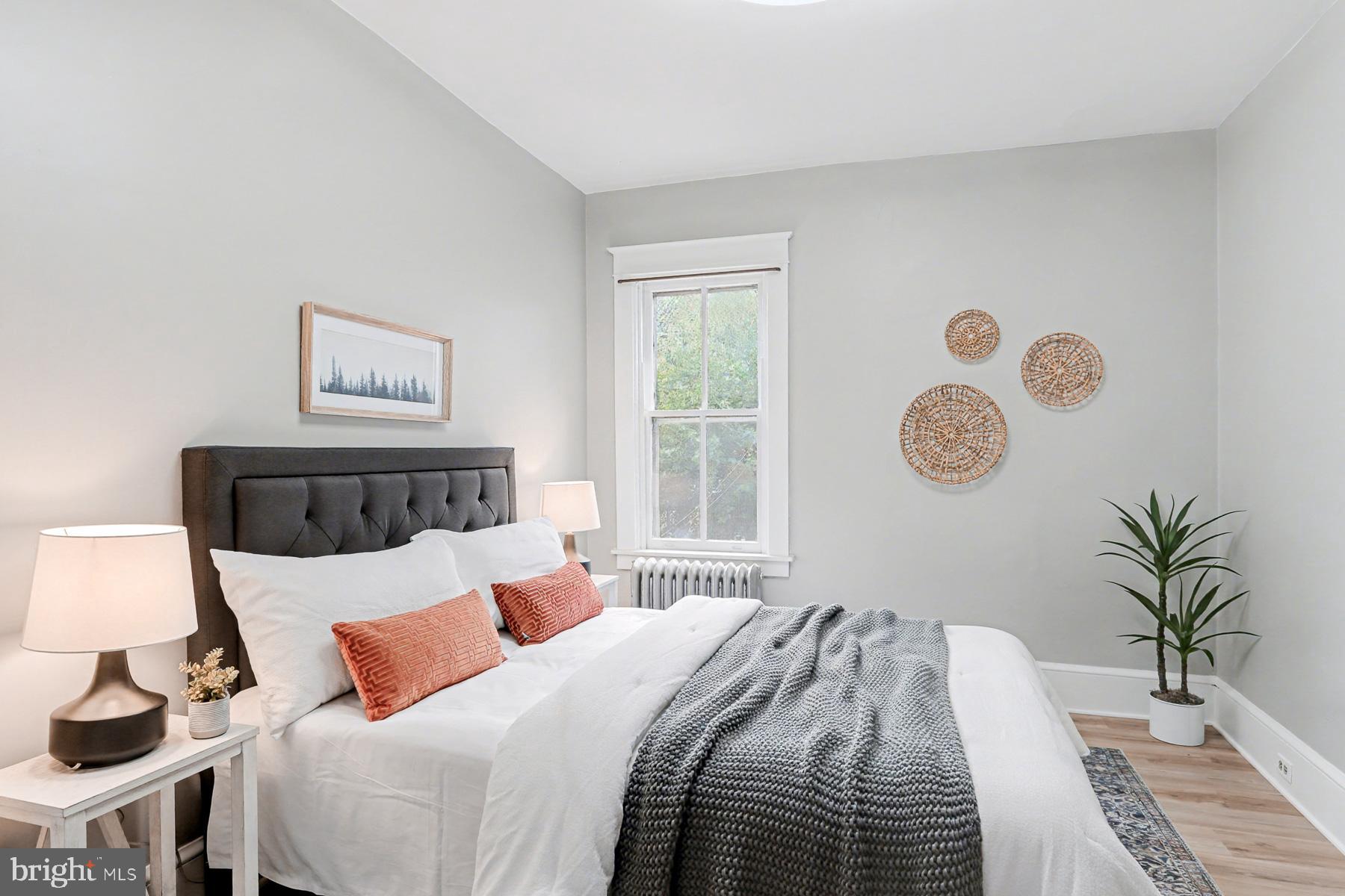 16 West Liberty Street Lancaster, PA 17603 - Photo 35 of 55 a bedroom with a bed and a window