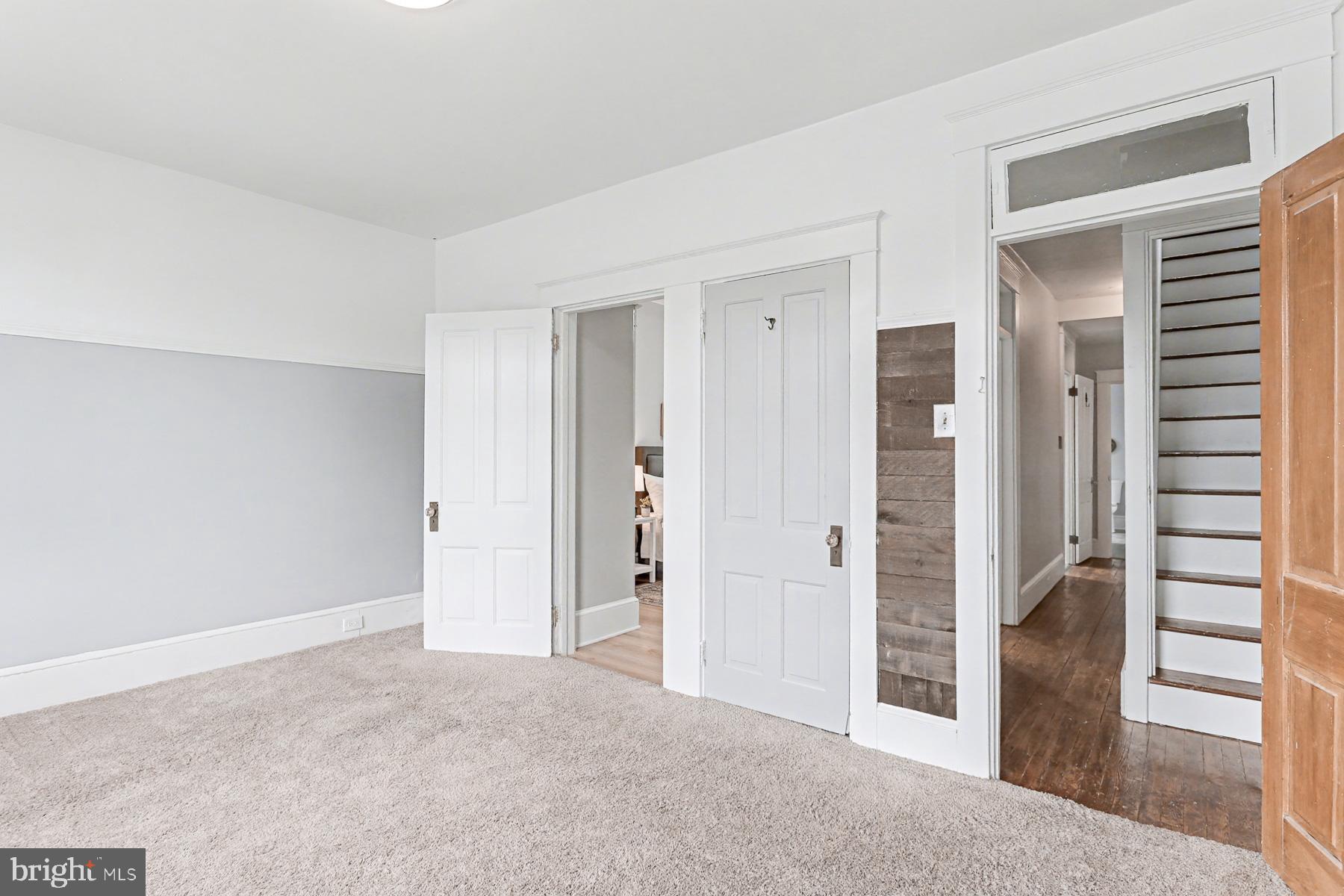 16 West Liberty Street Lancaster, PA 17603 - Photo 39 of 55 a view of a hallway with a room and stairs