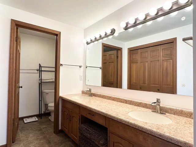 a view of a hallway with closet area