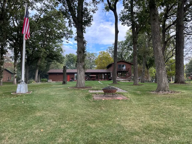 a house with trees in the background