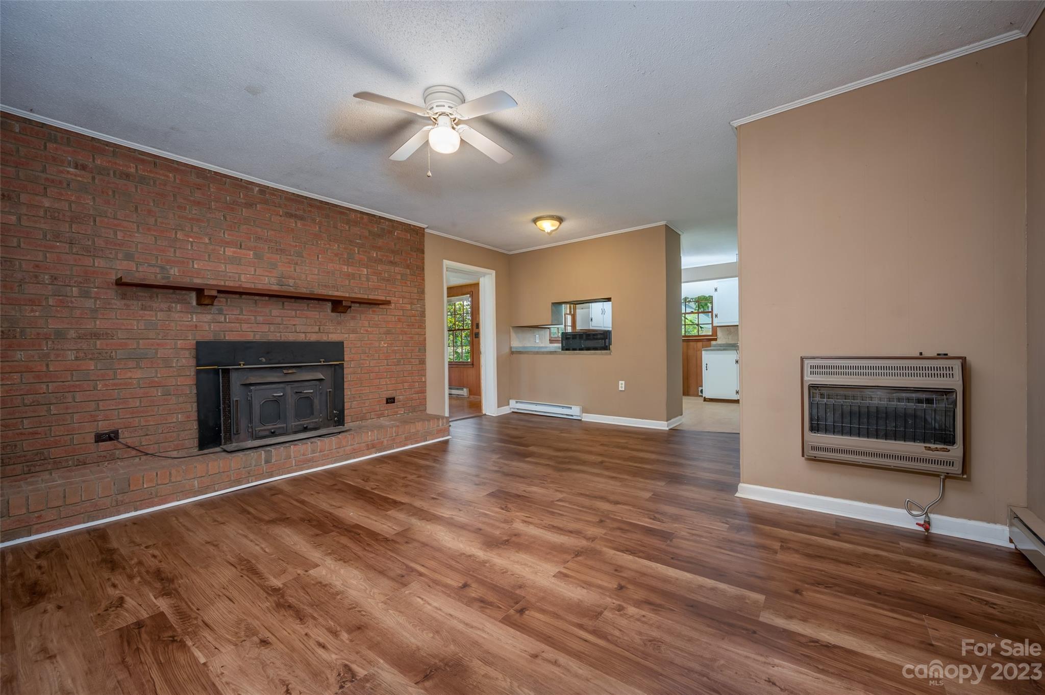 1034 Old Stonecutter Road Rutherfordton, NC 28139 - Photo 12 of 27 a view of a livingroom with a fireplace