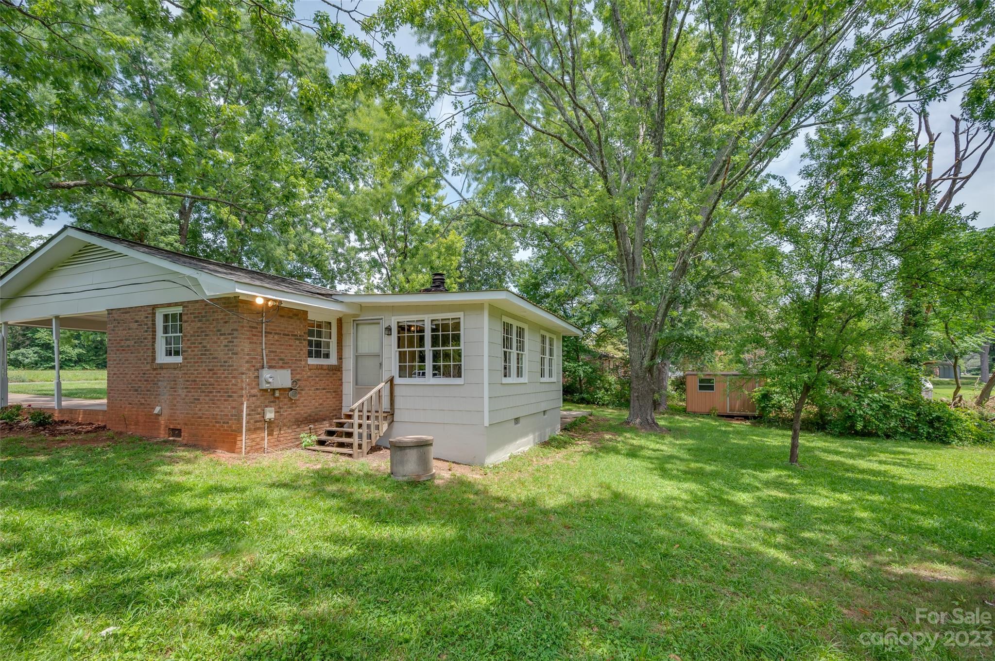1034 Old Stonecutter Road Rutherfordton, NC 28139 - Photo 21 of 27 a front view of house with yard and green space