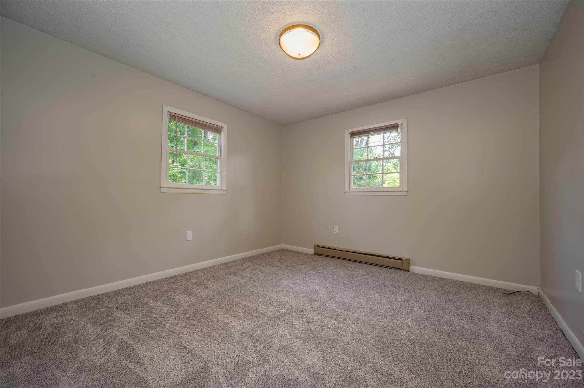 1034 Old Stonecutter Road Rutherfordton, NC 28139 - Photo 7 of 27 an empty room with a window