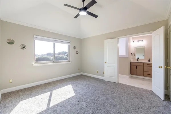 a view of a kitchen with a sink hardwood floor and a window