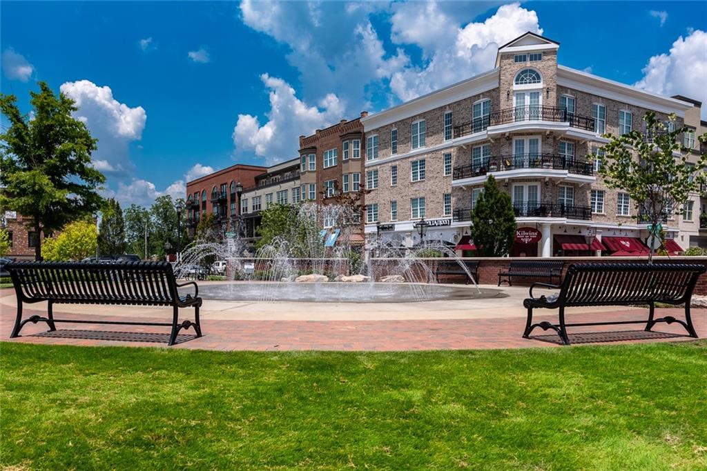 12720 Morningpark Circle Alpharetta, GA 30004 - Photo 27 of 31 a swimming pool with outdoor seating and yard