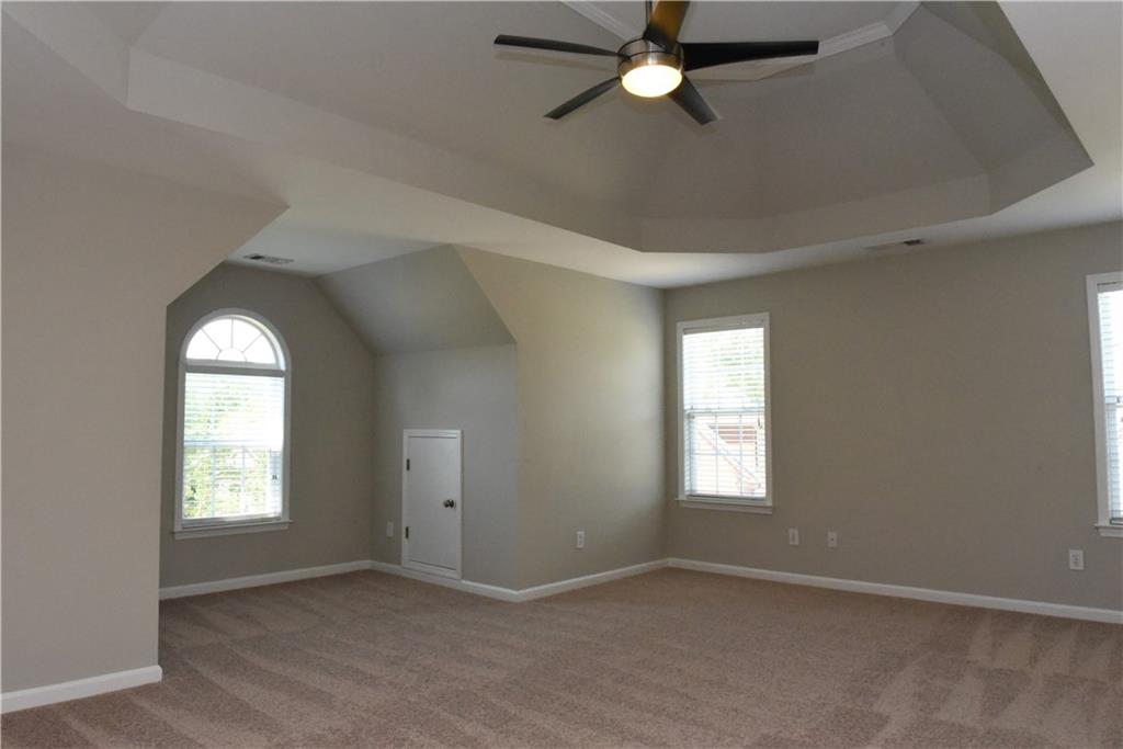 12720 Morningpark Circle Alpharetta, GA 30004 - Photo 9 of 31 an empty room that has a window