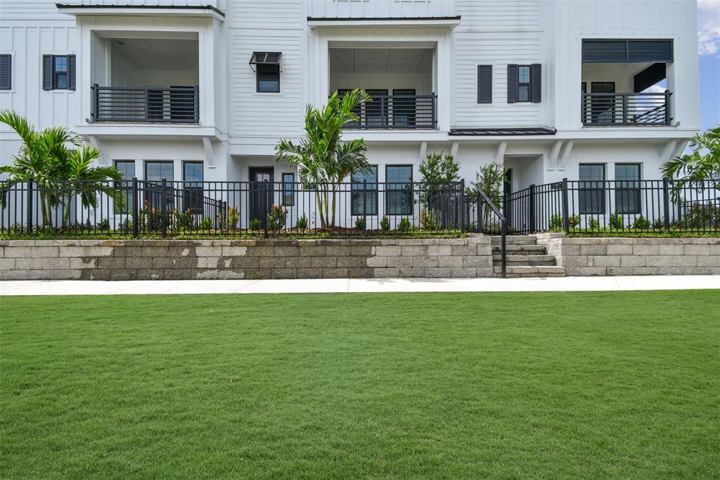7204 Sutton Lane Sarasota, FL 34240 - Photo 5 of 47 a front view of house with yard