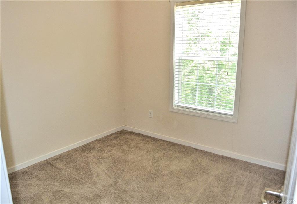 335 Upper Thomas Branch Road Marshall, NC 28753 - Photo 15 of 22 an empty room with a window