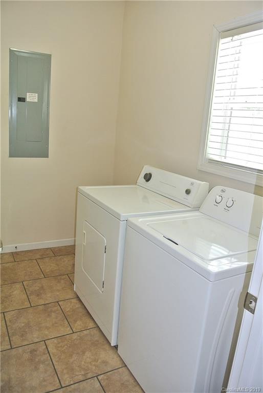 335 Upper Thomas Branch Road Marshall, NC 28753 - Photo 7 of 22 a utility room with dryer and washer