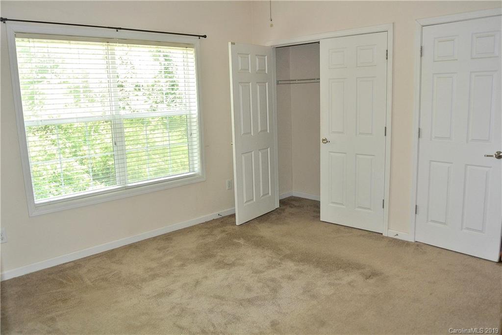 335 Upper Thomas Branch Road Marshall, NC 28753 - Photo 10 of 22 a view of an empty room with a window