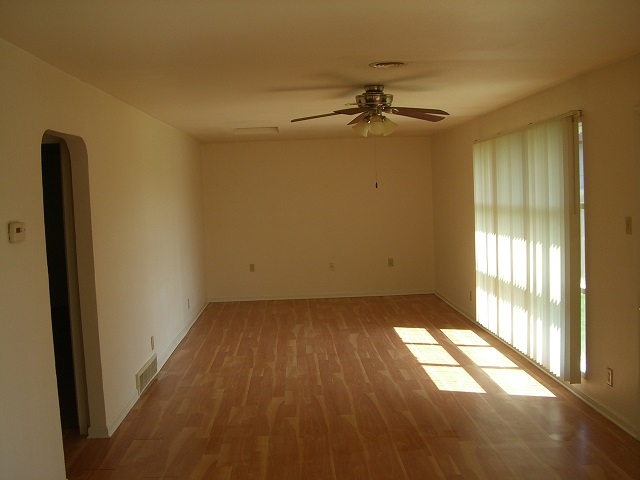 2114 Rivington Road Loves Park, IL 61111 - Photo 2 of 7 a view of an empty room and a window