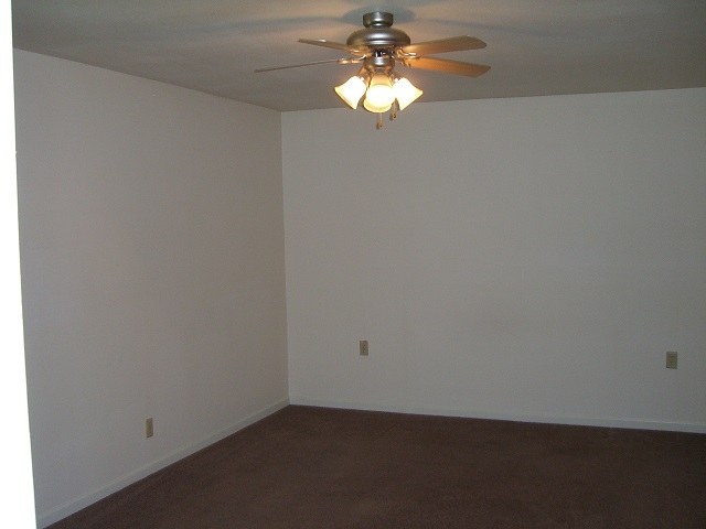 2114 Rivington Road Loves Park, IL 61111 - Photo 5 of 7 a view of a chandelier fan in a room