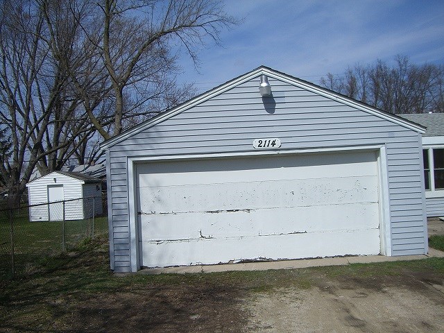 2114 Rivington Road Loves Park, IL 61111 - Photo 7 of 7 a front view of a house with a yard