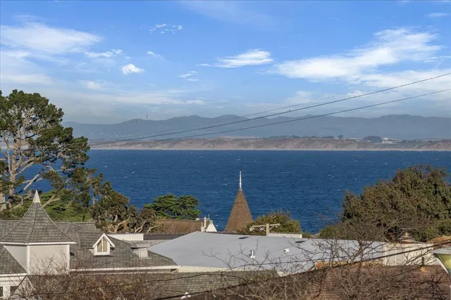 a view of a balcony with an ocean view