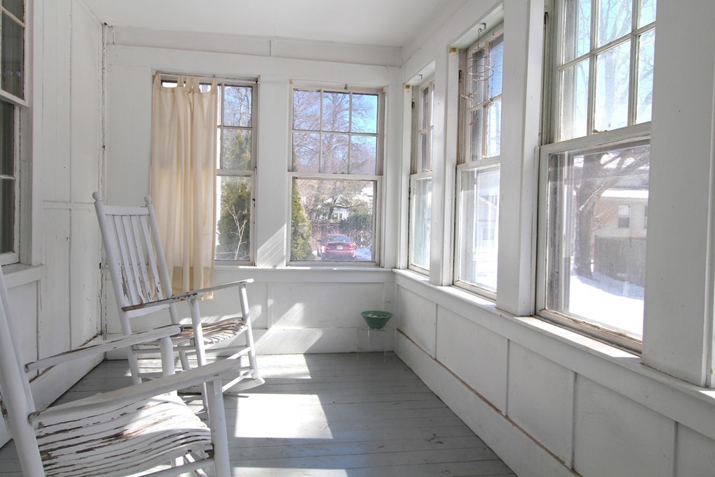 68 County Road, Unit 1 Ipswich, MA 01938 - Photo 12 of 22 a living room with furniture and large windows