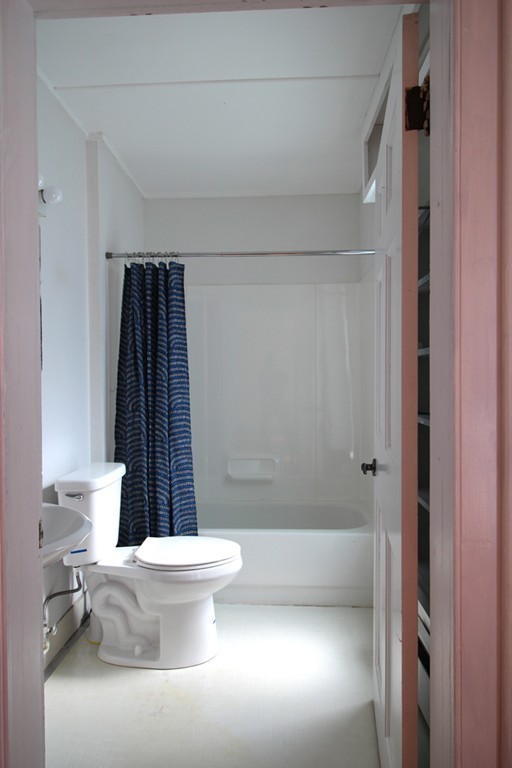 68 County Road, Unit 1 Ipswich, MA 01938 - Photo 17 of 22 a bathroom with a toilet and a shower