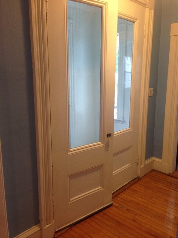 68 County Road, Unit 1 Ipswich, MA 01938 - Photo 4 of 22 a view of front door with wooden floor