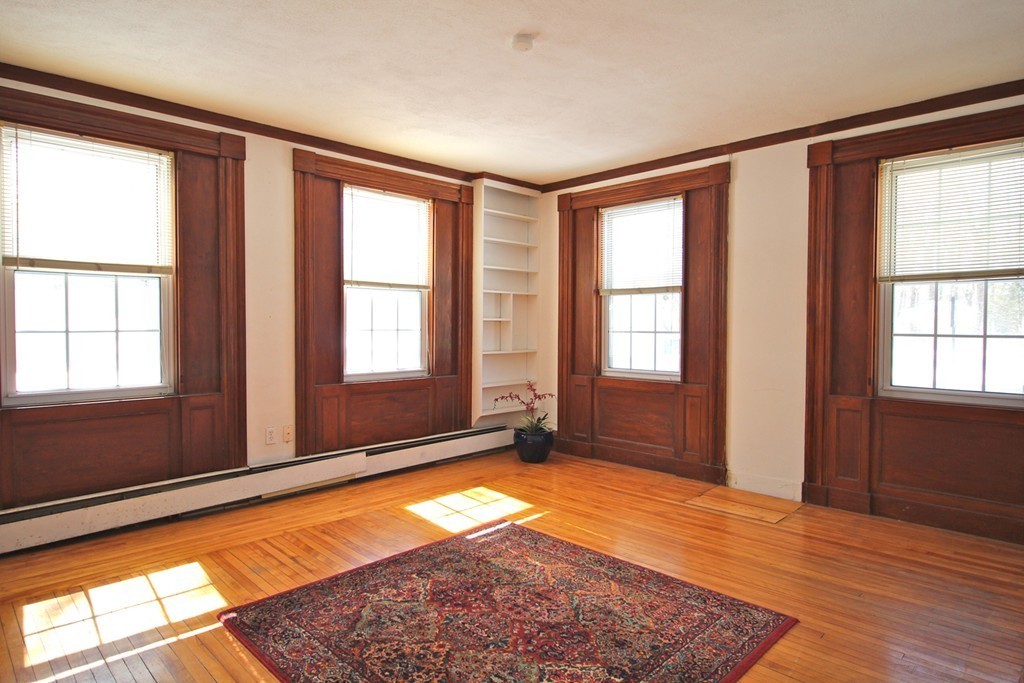 68 County Road, Unit 1 Ipswich, MA 01938 - Photo 7 of 22 a view of an empty room with a window