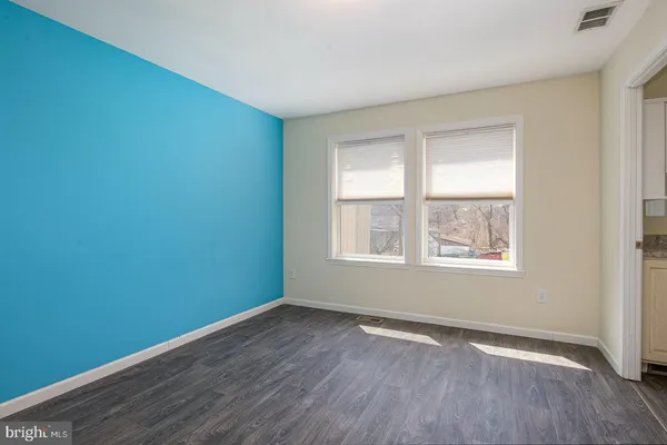 a view of a yard with trees