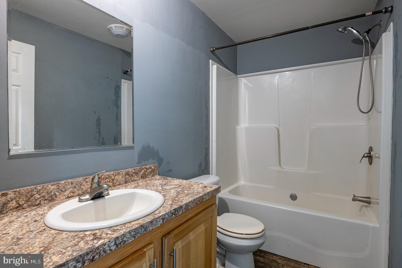 25 Thaddeus Lane Reading, PA 19606 - Photo 18 of 36 a bathroom with a granite countertop sink toilet and shower