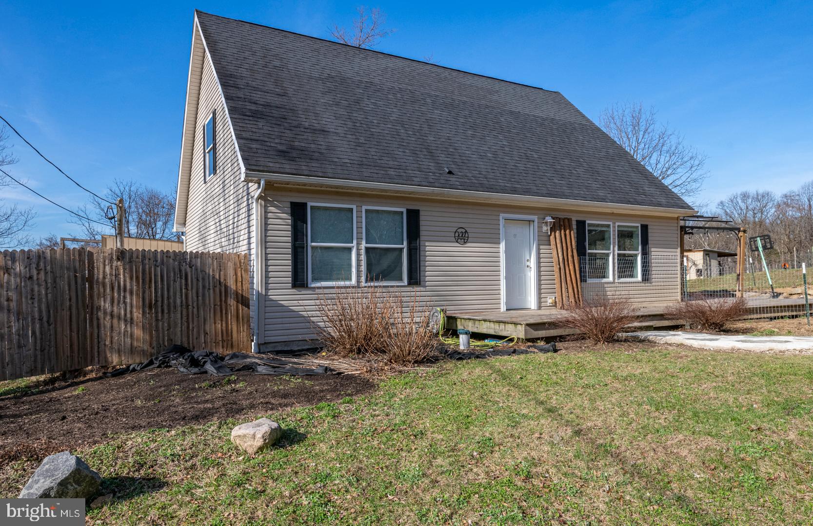 25 Thaddeus Lane Reading, PA 19606 - Photo 2 of 36 a front view of a house with a yard