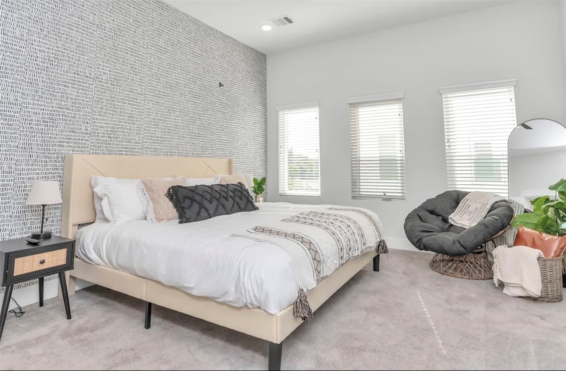 2817 Palm Street Houston, TX 77004 - Photo 13 of 18 a bedroom with a bed and a couch