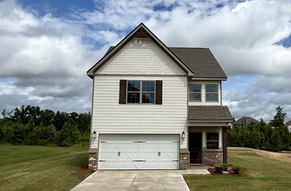 6 Liberty Place Fort Mitchell, AL 36856 - Photo 1 of 27 a front view of a house with garden