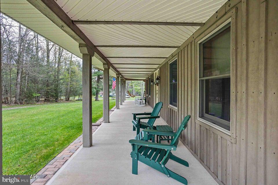 2270 Pine Tree Road Hughesville, PA 17737 - Photo 15 of 90 Charming porch with serene views.