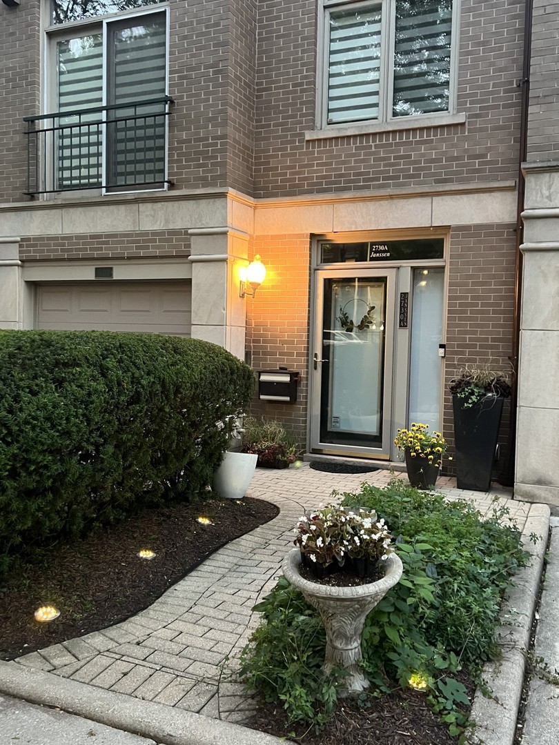 a house view with a garden space