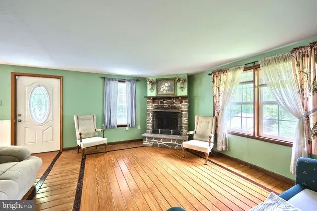 a view of a big room with wooden floor