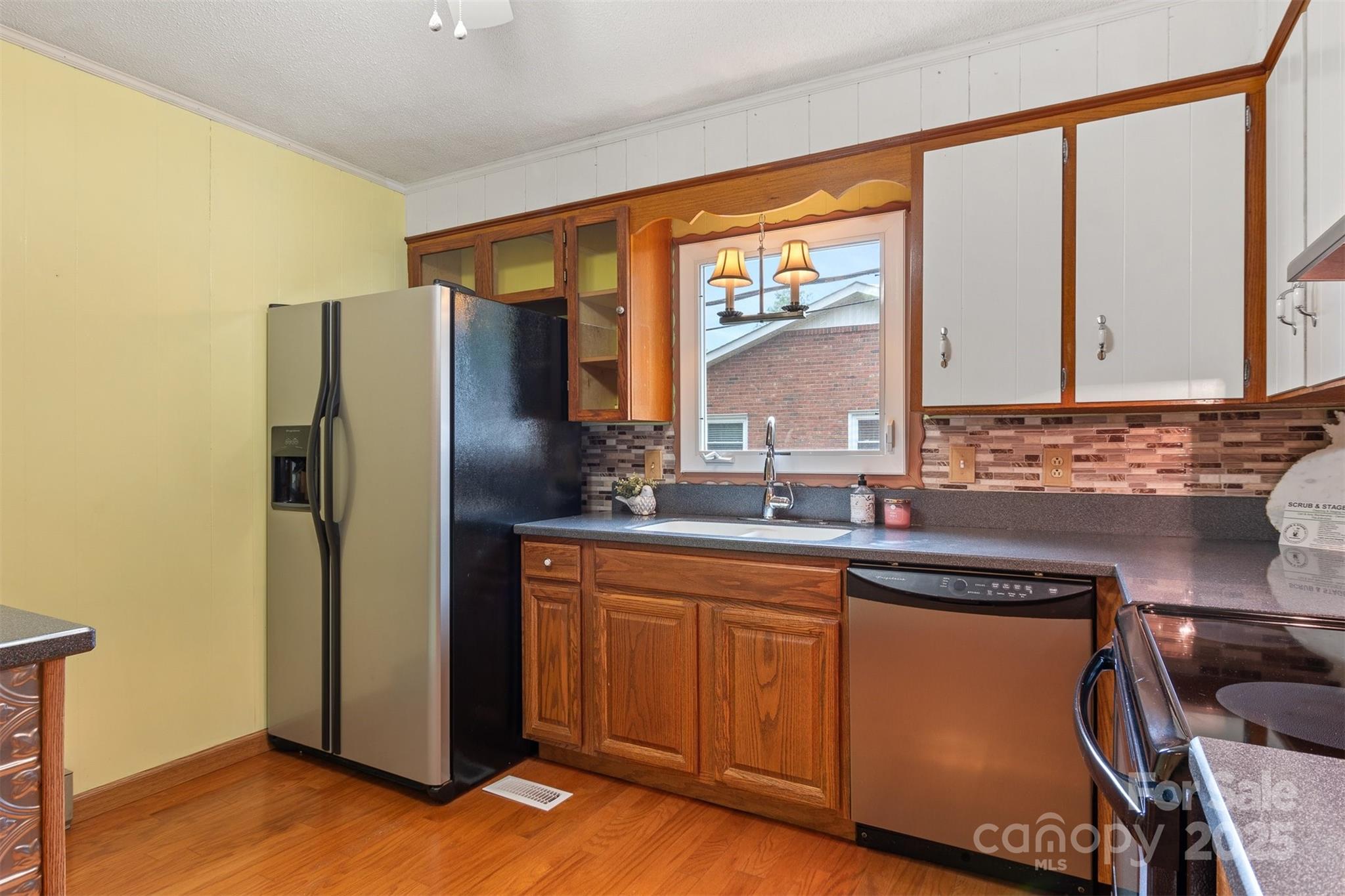 1405 8th Avenue Northwest Conover, NC 28613 - Photo 12 of 41 a kitchen with stainless steel appliances granite countertop a refrigerator and a sink