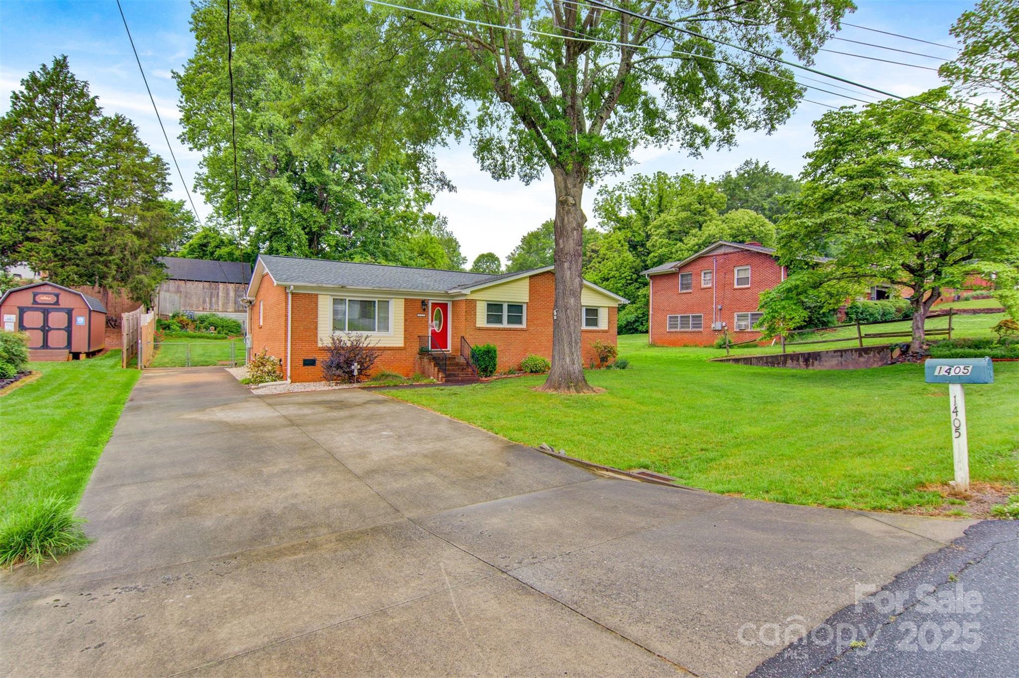 1405 8th Avenue Northwest Conover, NC 28613 - Photo 3 of 41 a front view of house with yard and green space