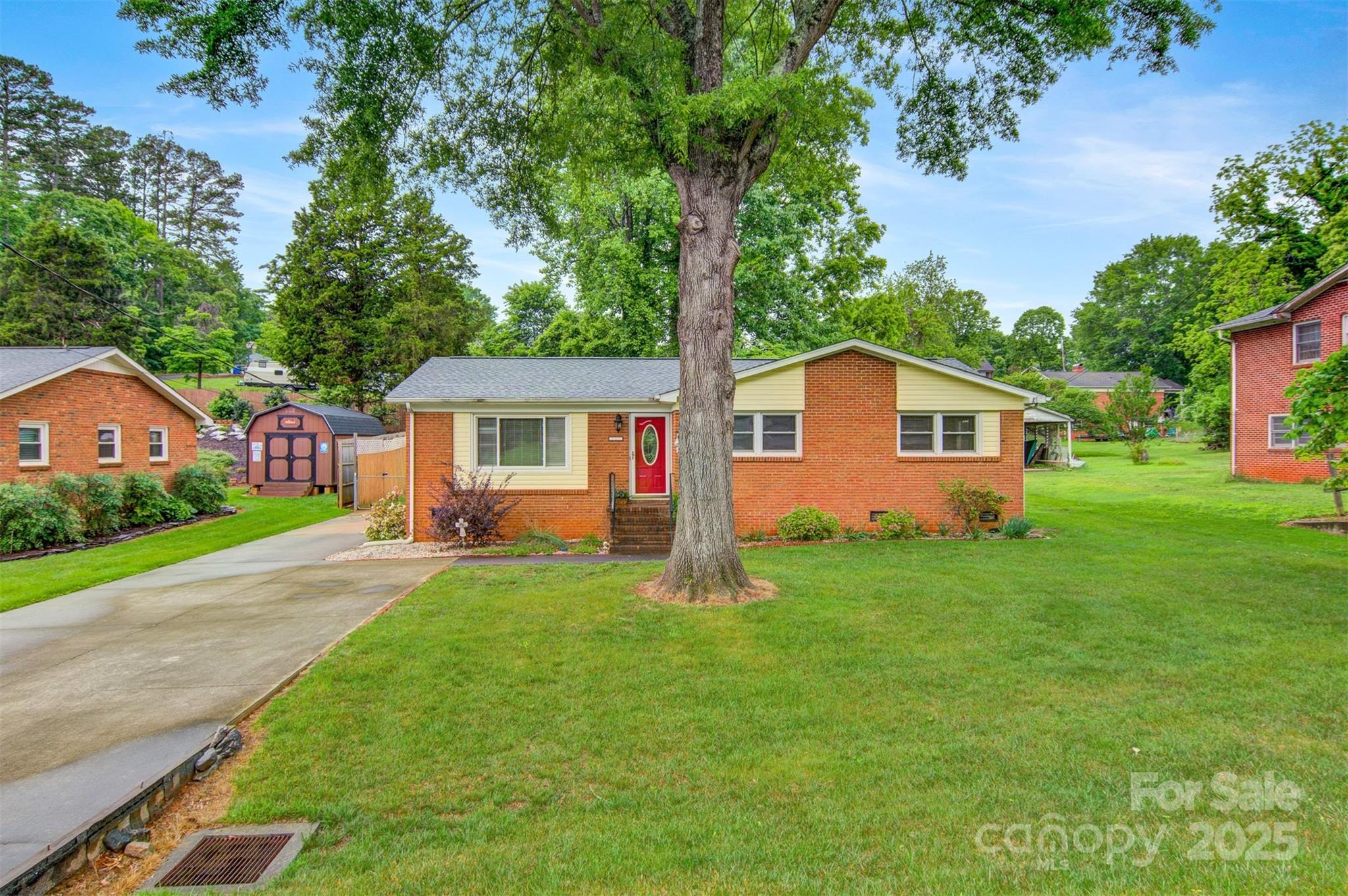 1405 8th Avenue Northwest Conover, NC 28613 - Photo 33 of 41 a front view of house with yard and green space