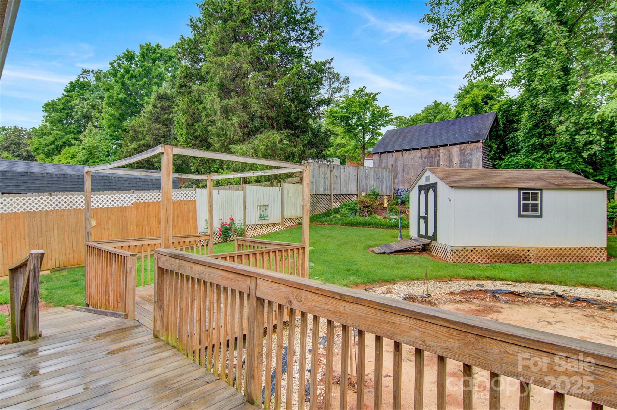 1405 8th Avenue Northwest Conover, NC 28613 - Photo 37 of 41 a view of a house with a yard and fence