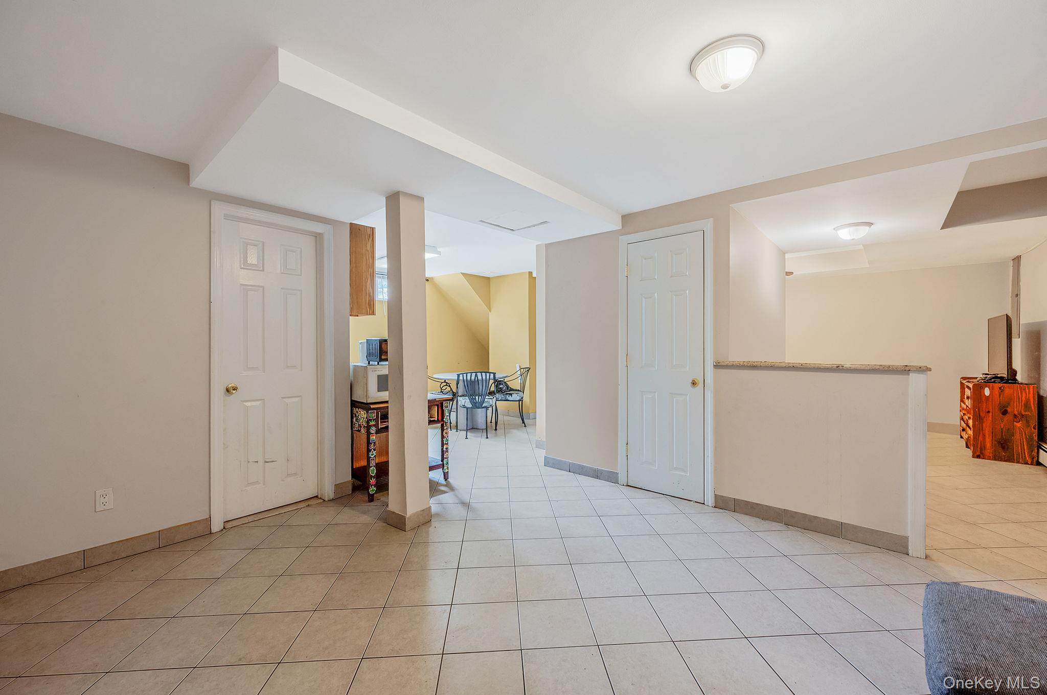 557 Newbridge Road East Meadow, NY 11554 - Photo 11 of 31 a view of a storage & utility room with furniture