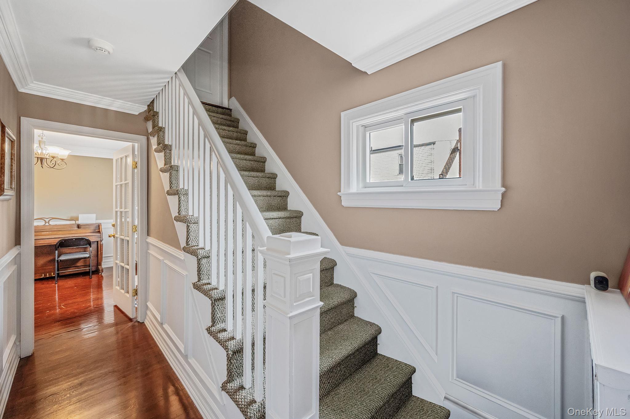 557 Newbridge Road East Meadow, NY 11554 - Photo 17 of 31 a view of entryway and hall with wooden floor