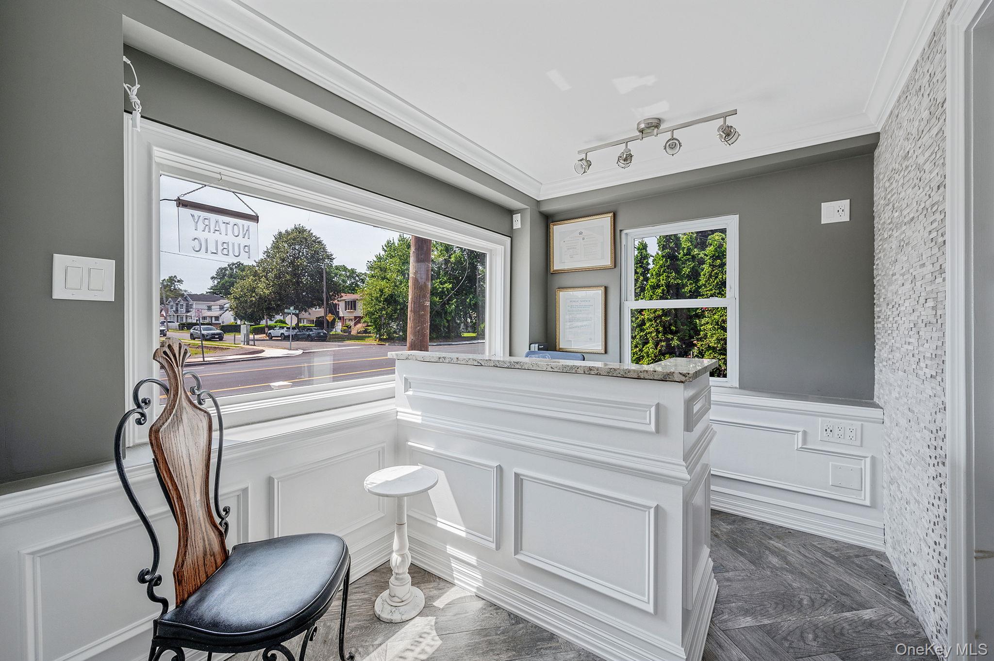 557 Newbridge Road East Meadow, NY 11554 - Photo 27 of 31 a bathroom with a toilet sink and mirror