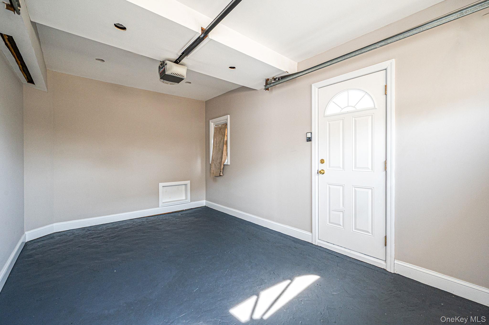 557 Newbridge Road East Meadow, NY 11554 - Photo 29 of 31 a view of an empty room with a window