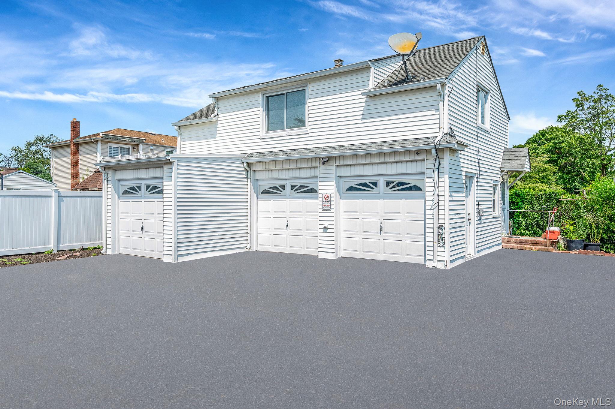 557 Newbridge Road East Meadow, NY 11554 - Photo 4 of 31 a view of a house with a street
