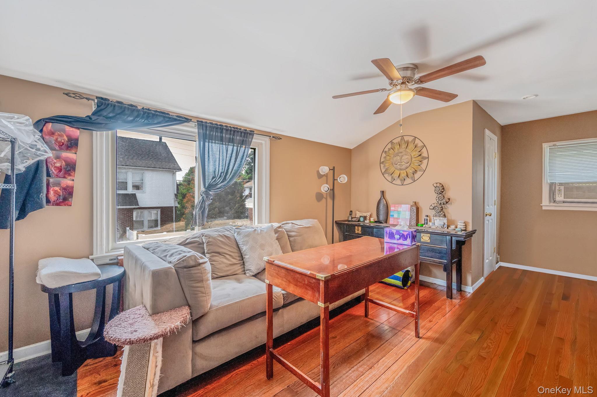 557 Newbridge Road East Meadow, NY 11554 - Photo 6 of 31 a view of a dining room with furniture window and wooden floor