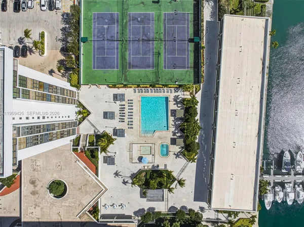 a table and chairs sitting in front of a building