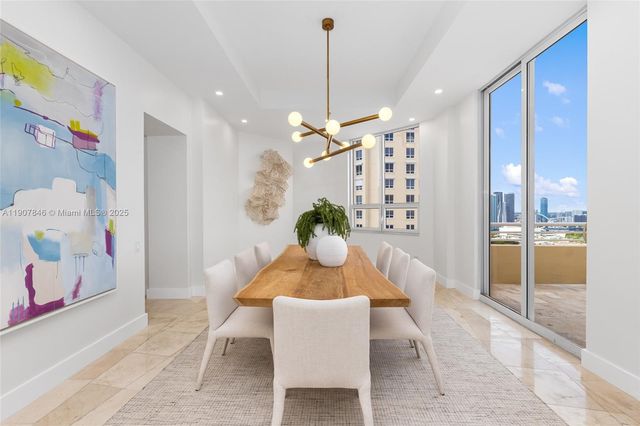 a view of a dining room with furniture