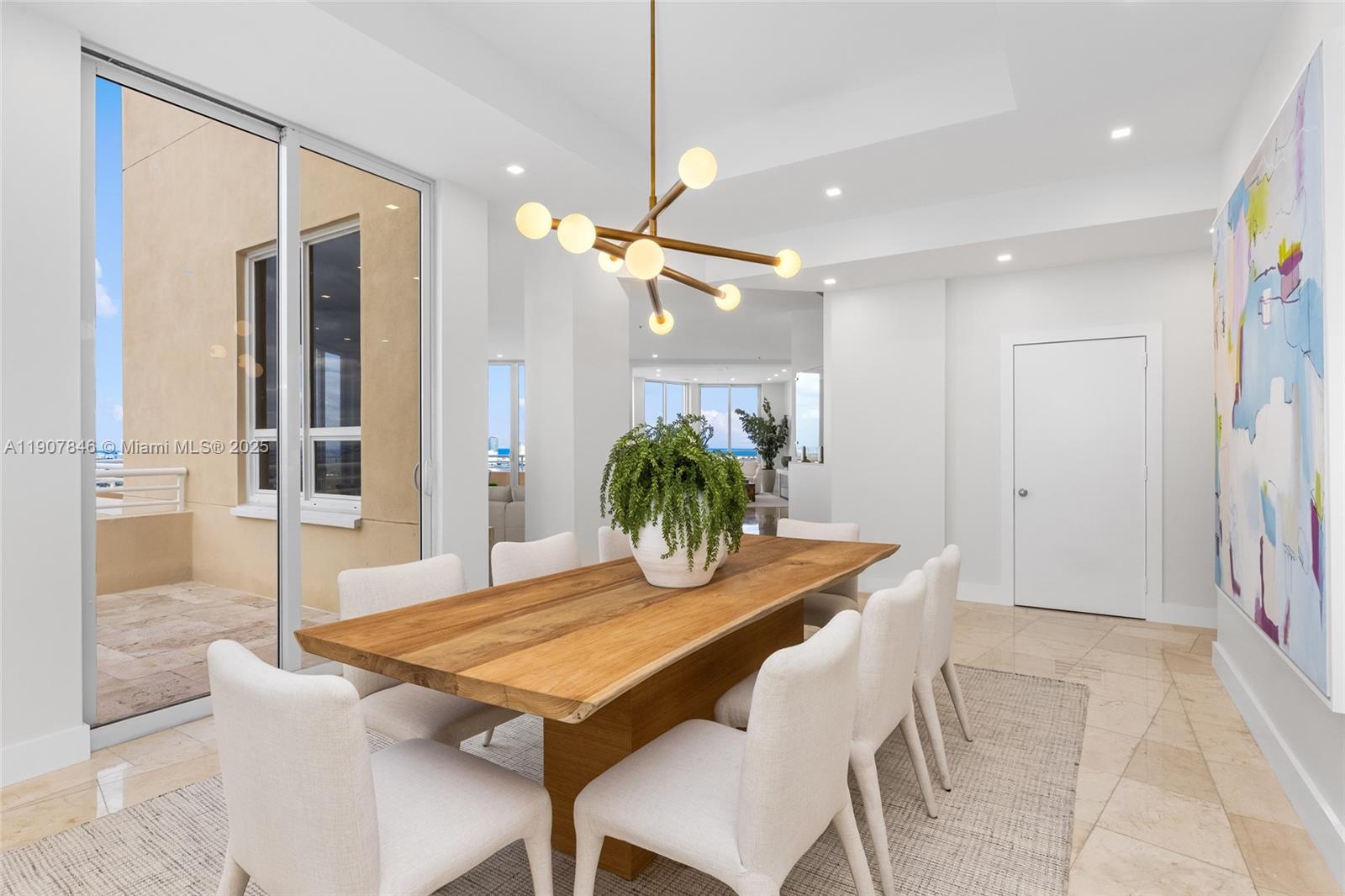 808 Brickell Key Drive, Unit 3901 Miami, FL 33131 - Photo 14 of 72 a view of a dining room with furniture