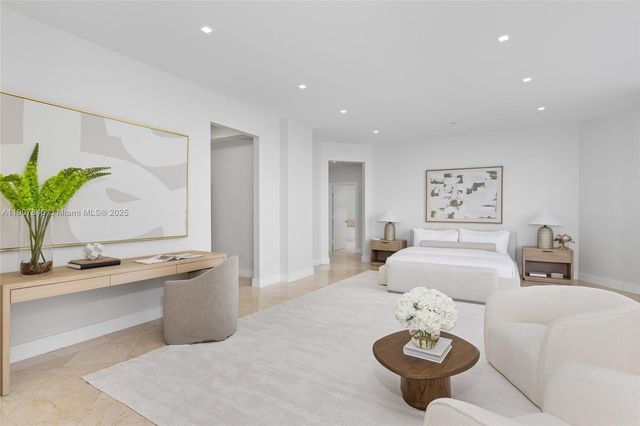 a bathroom with a shower and a bath tub