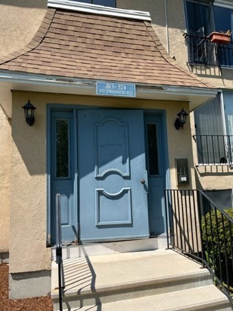 202 Swanson Road, Unit 521 Boxborough, MA 01719 - Photo 1 of 16 a view of a house with a balcony