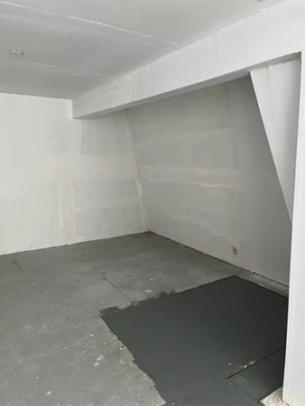 202 Swanson Road, Unit 521 Boxborough, MA 01719 - Photo 12 of 16 an empty room with a window